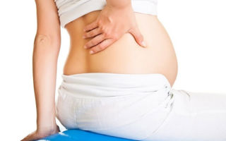 Почему болит спина при беременности — причины появления + безопасные методы лечения