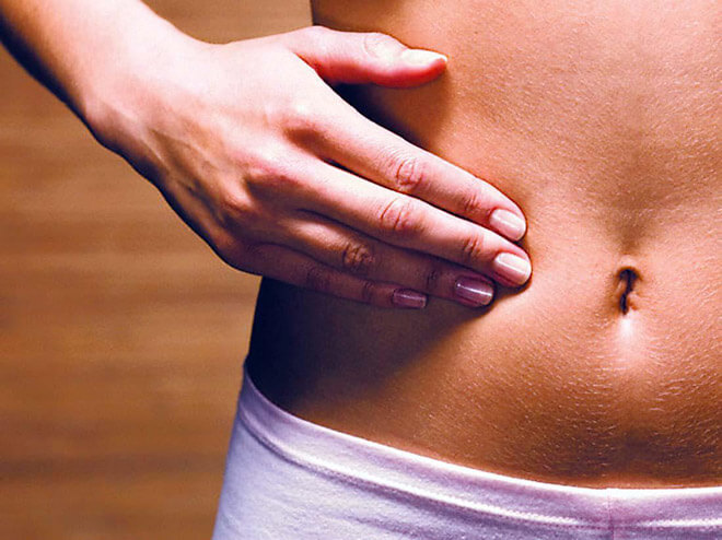 Как облегчить боль в боку