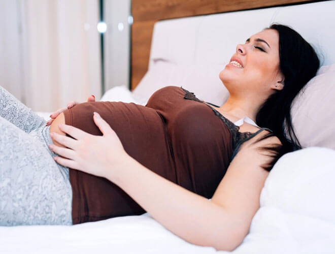 Почему болит между ног во время беременности