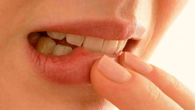 Почему у беременных болят десны